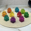 ده رنگ مختلف از گلدان مینیاتوری شیشه ای طرح مکعبی در یک قاب